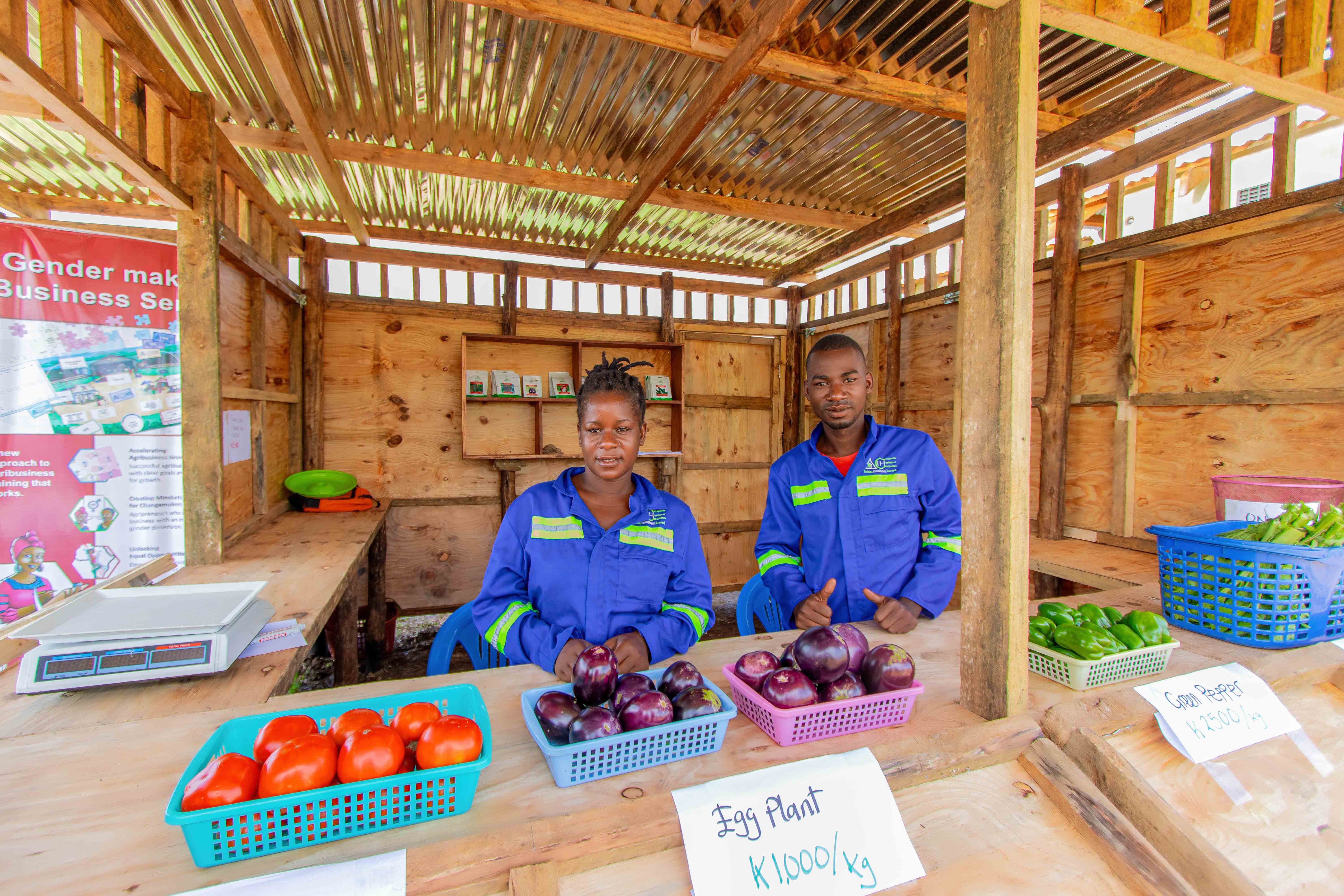 students selling produce at cih campus shop 